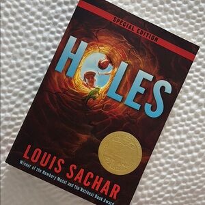 🧡'Holes' Special Edition by Louis Sachar Paperback Book - Orange and Black